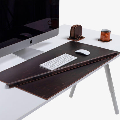 Leather desk mat on the desk 