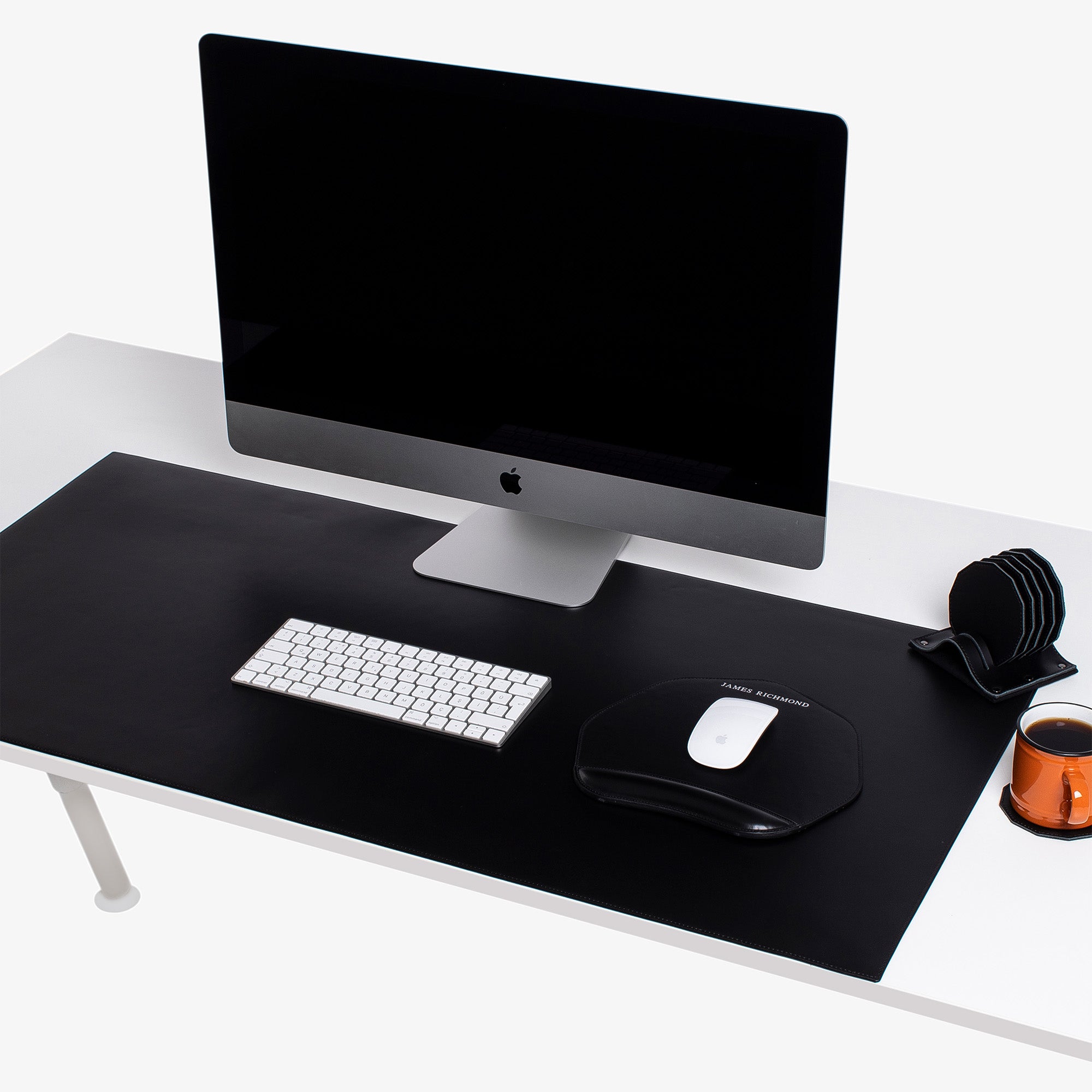 Black Leather desk mat on the desk #color_black