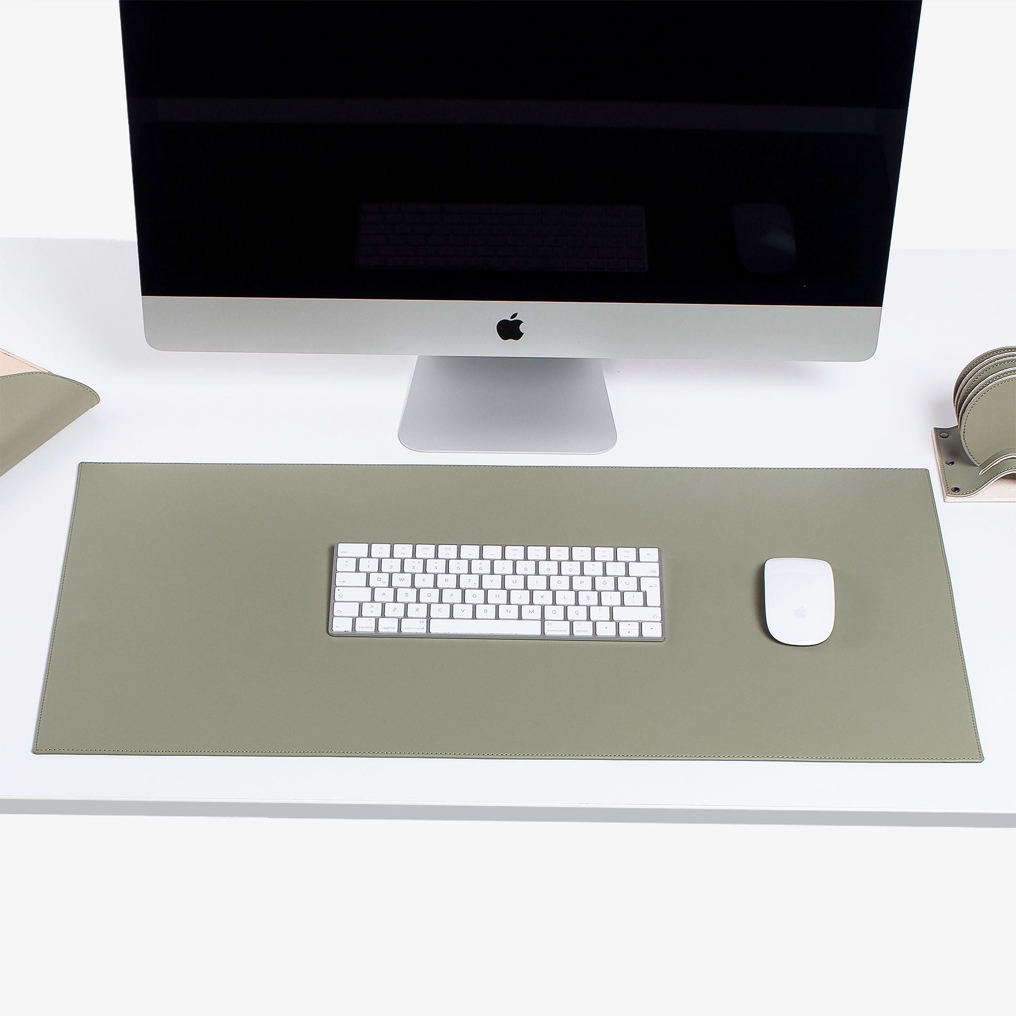 Green  Leather desk mat on the desk  #color_sage-green