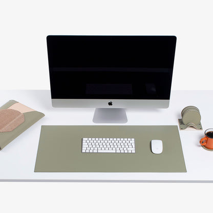 Green  Leather desk mat on the desk  