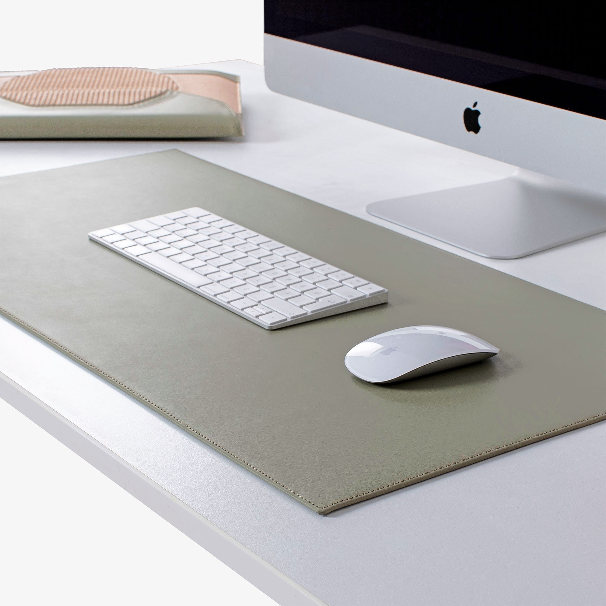 Green  Leather desk mat on the desk  