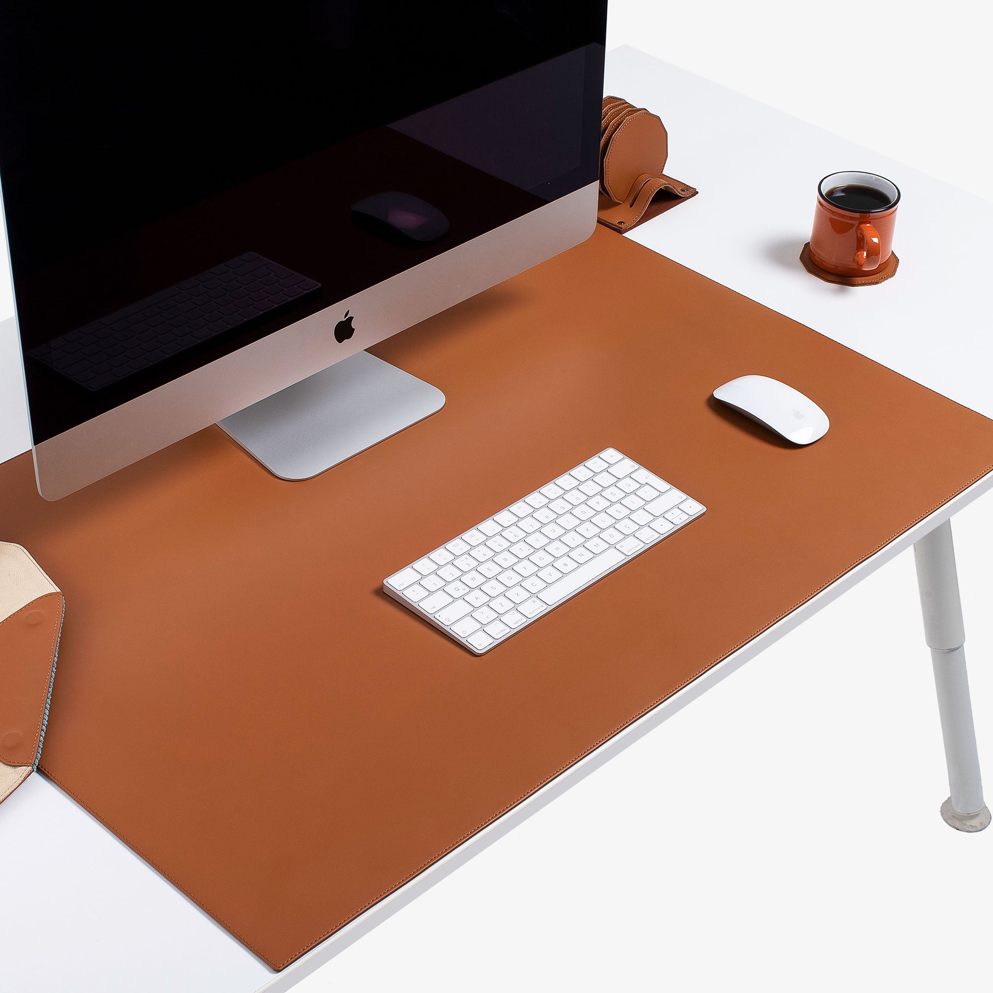 Brown Leather desk mat on the desk #color_cognac