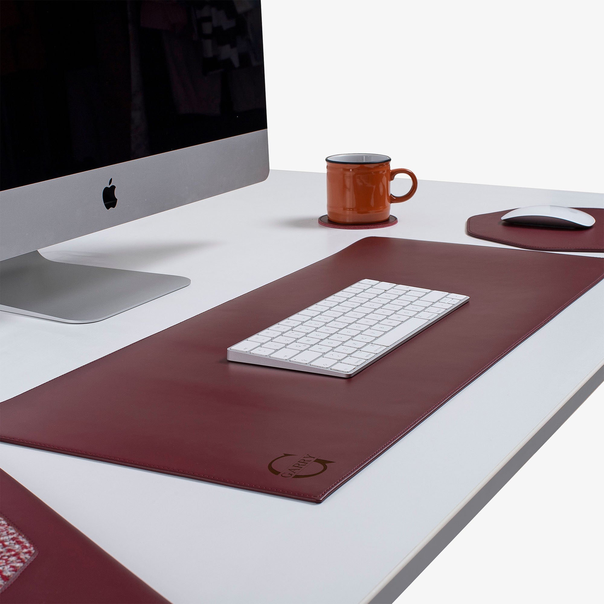 Red Leather desk mat on the desk   