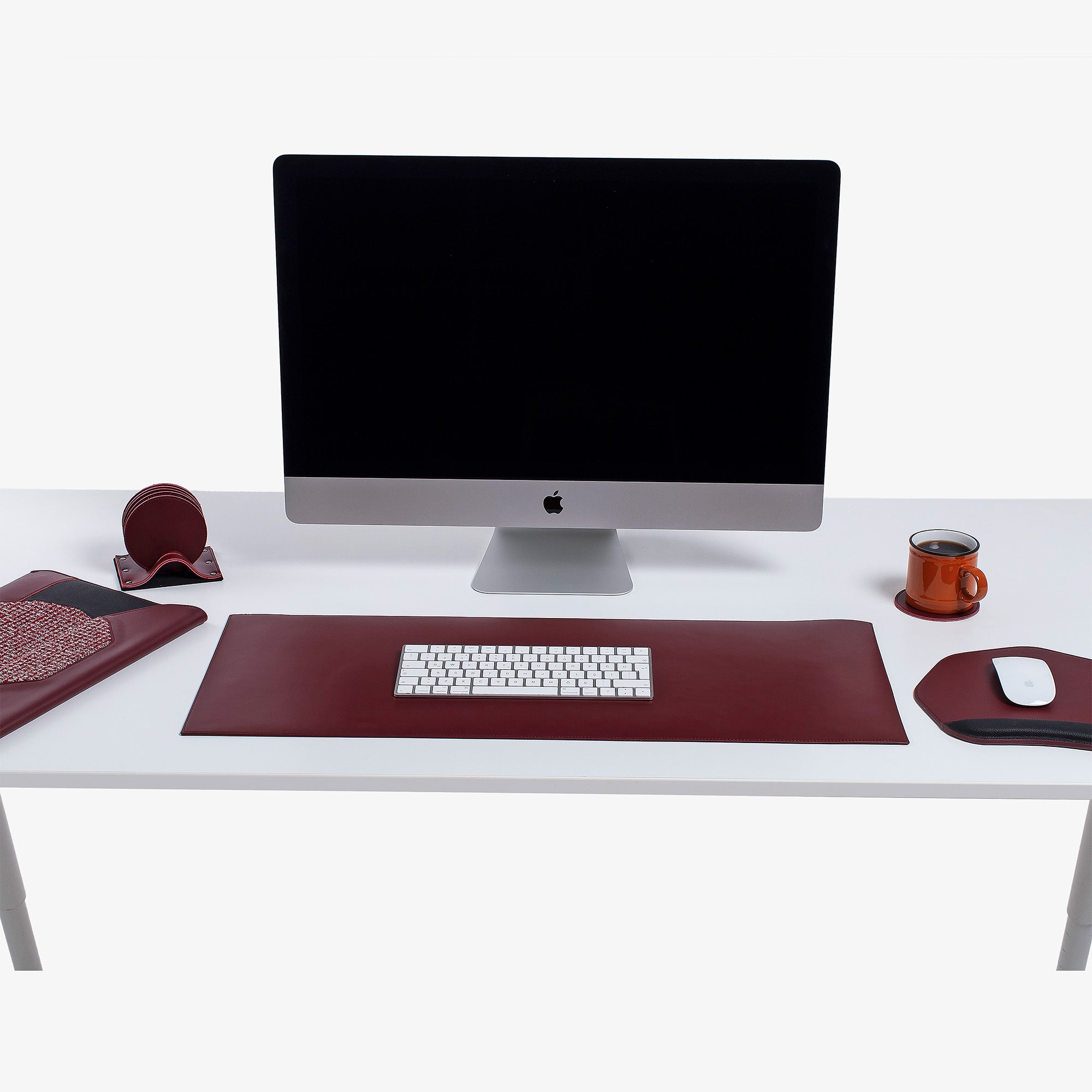 Red Leather desk mat on the desk   