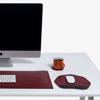 Red Leather desk mat on the desk   