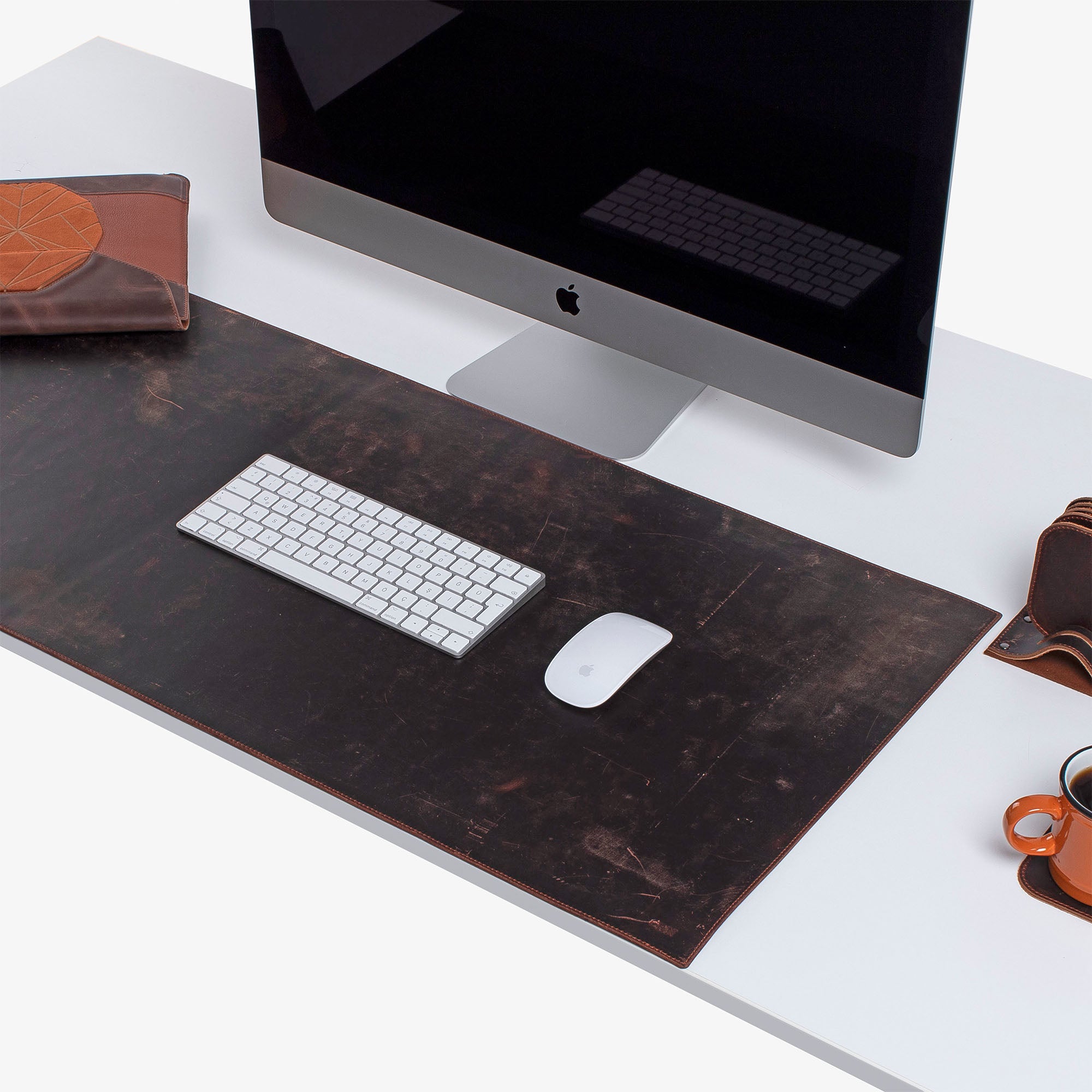 Brown Leather desk mat on the desk 