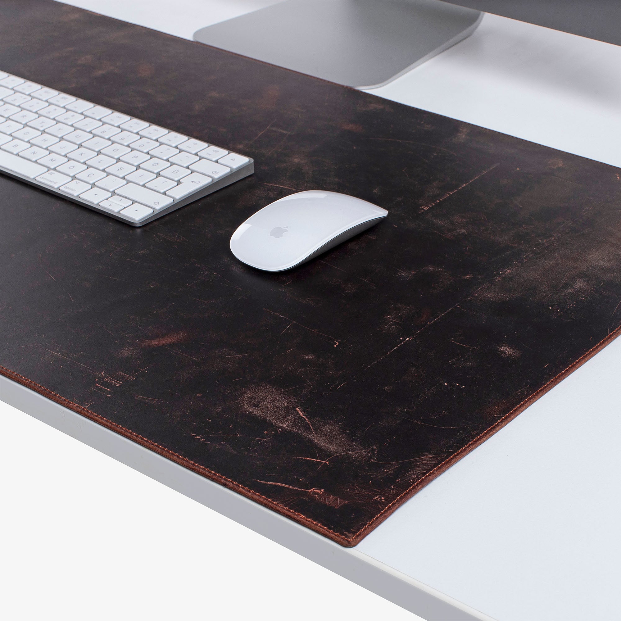 Brown Leather desk mat on the desk 