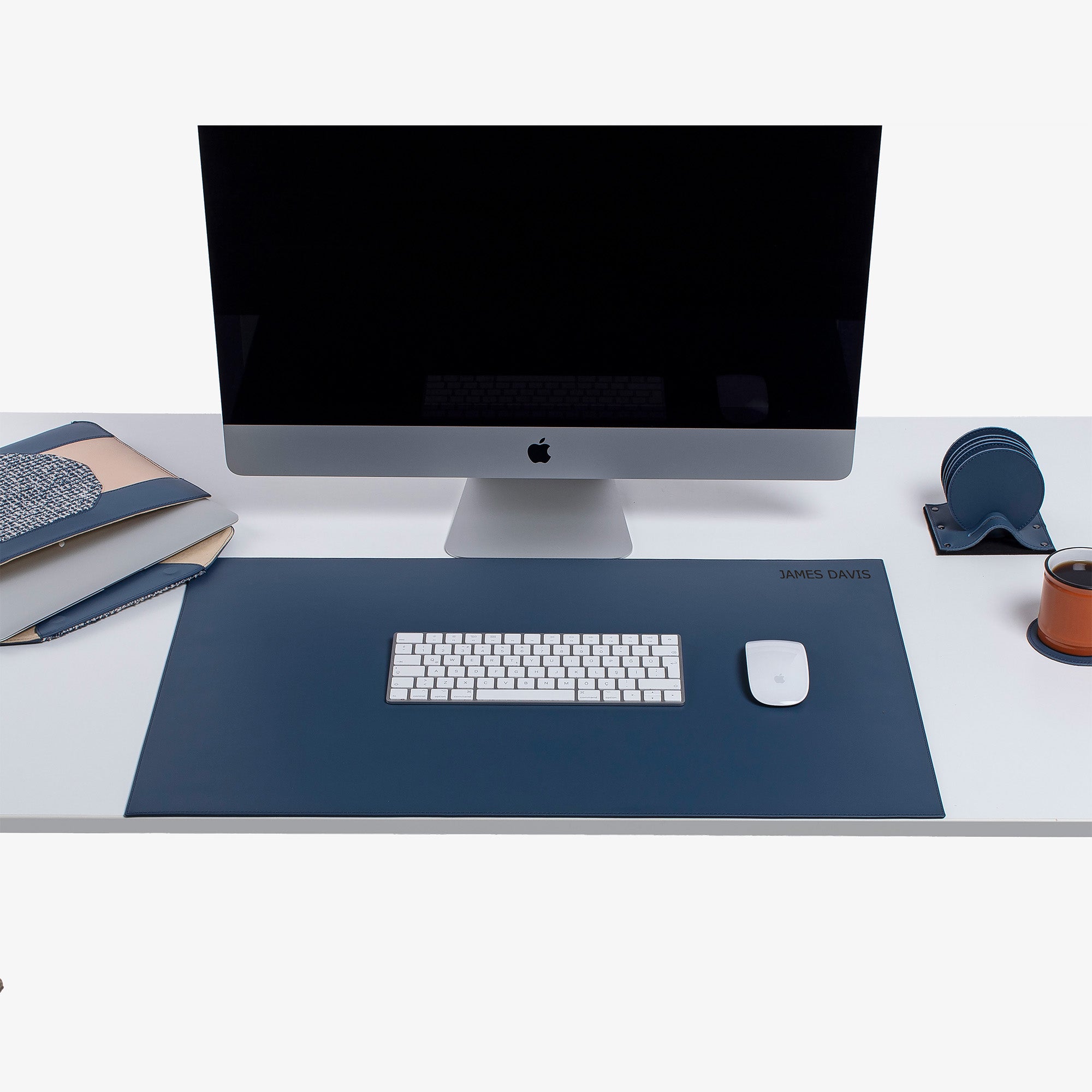 blue Leather desk mat on the desk  