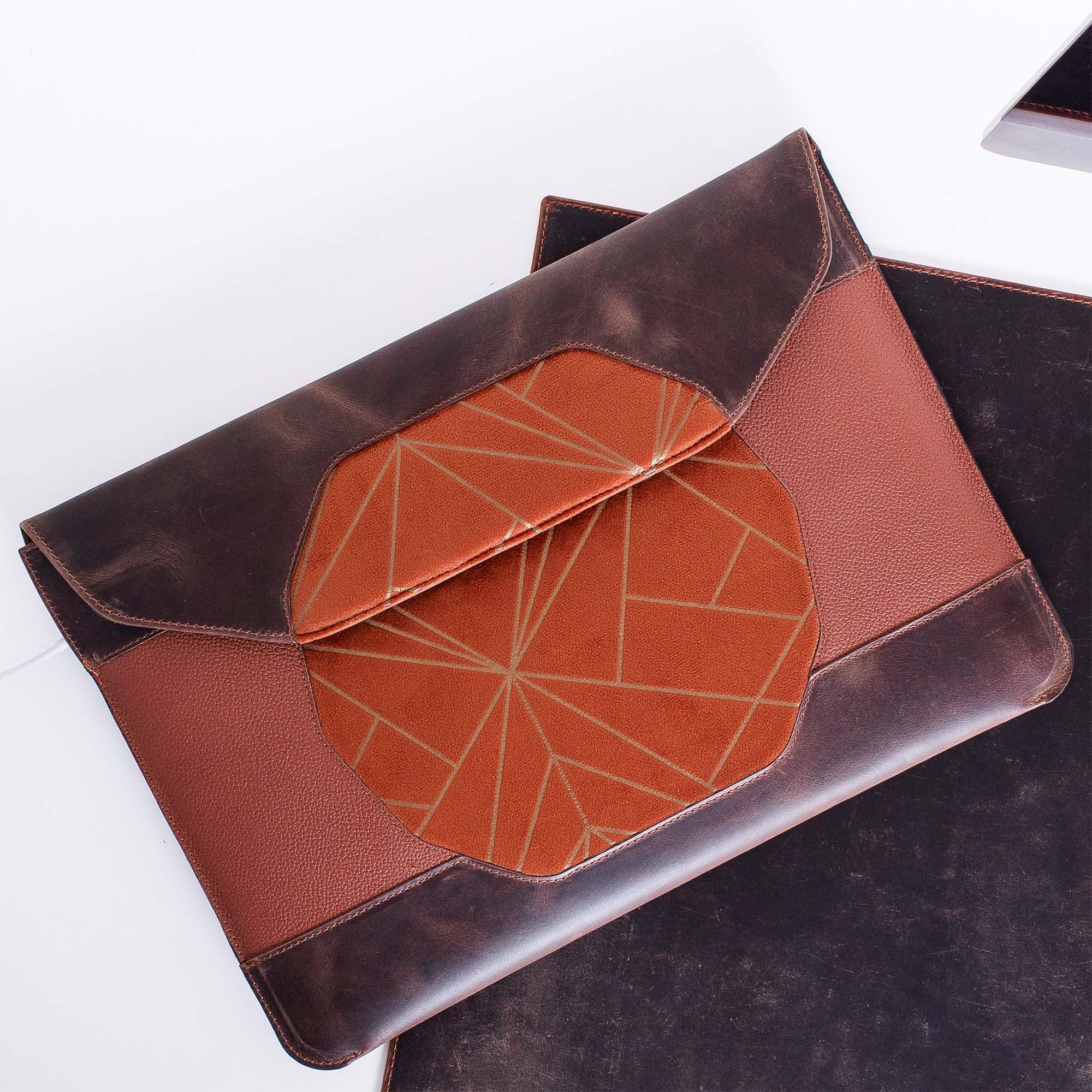 Custom brown distressed leather MacBook sleeve with personalization options  