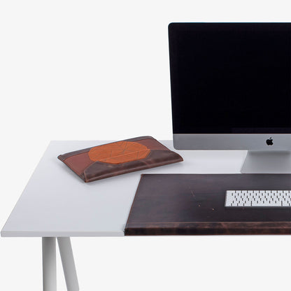 Custom brown distressed leather MacBook sleeve with padded design  