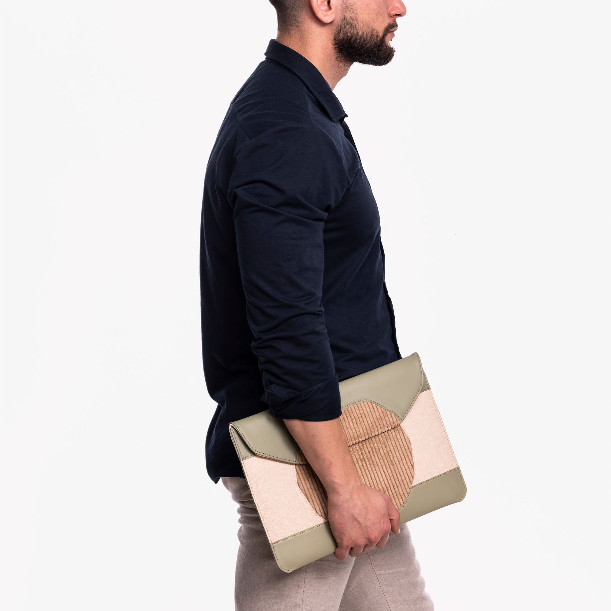 Model holding Personalized green leather MacBook sleeve for MacBook 13 #color_sage-green