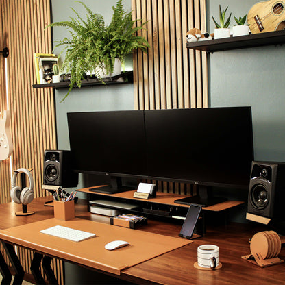 desk mat with edge protector on the desk with other desk accessories 